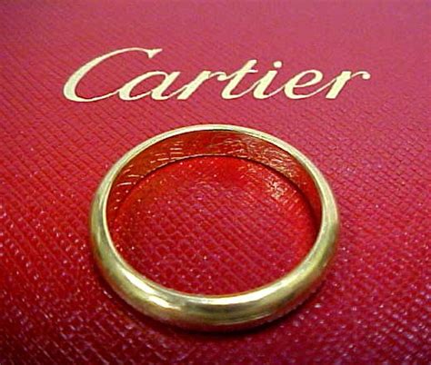 cartier ring marked 750.